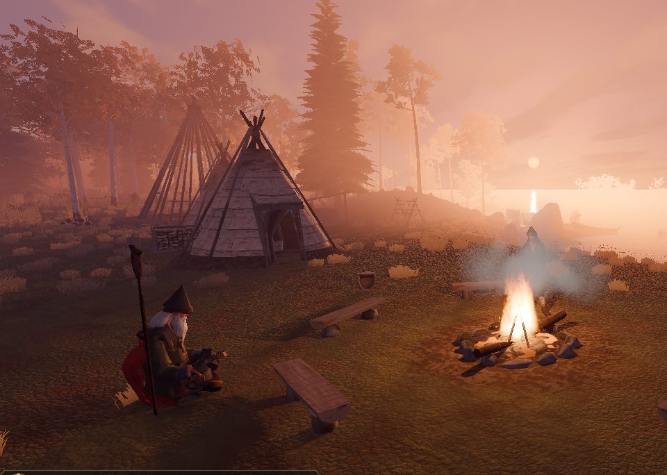 Autumn dawn at the Kylä camp — sun rays through the trees over the kota and the campfire